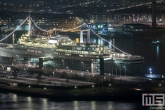 Te Koop | Het cruiseschip ss Rotterdam in Rotterdam Katendrecht in de avond