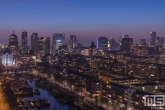 Te Koop | De skyline van Rotterdam met het Witte Huis tijdens zonsondergang