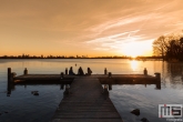 Te Koop | De steiger bij de Kralingse Plas in Rotterdam tijdens zonsondergang