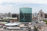 Het uitzicht vanaf de Laurenskerk op het WTC Rotterdam