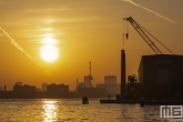 Te Koop | De skyline van Rotterdam tijdens zonsopkomst vanuit de RDM Rotterdam