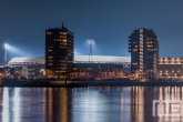 Te Koop | Het Feyenoord Stadion De Kuip in Rotterdam-Zuid tijdens het blauwe uurtje