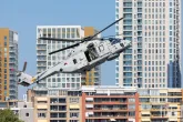 De Wereldhavendagen 2022 in Rotterdam met de helikopter N088 van de Koninklijke Marine boven de stad