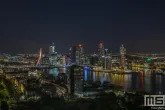 Te Koop | De Erasmusbrug met de skyline van Rotterdam in de kleur goud speciaal voor 10 jaar Werk aan de Muur
