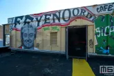 Het schitterende uitzicht vanaf Bovenop Zuid op een mural van Peter Houtman