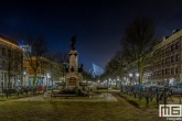 Te Koop | De Wihelminafontein op het Noordereiland in Rotterdam met op de achtergrond de Erasmusbrug