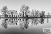 Te Koop | Het Veerhuis in Rotterdam Overschie in de sneeuw in zwart/wit